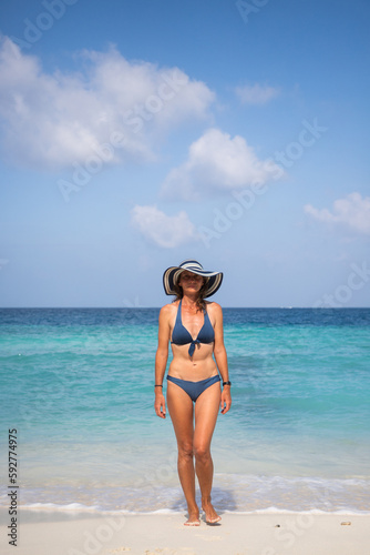 woman relaxing on beautiful tropical beach