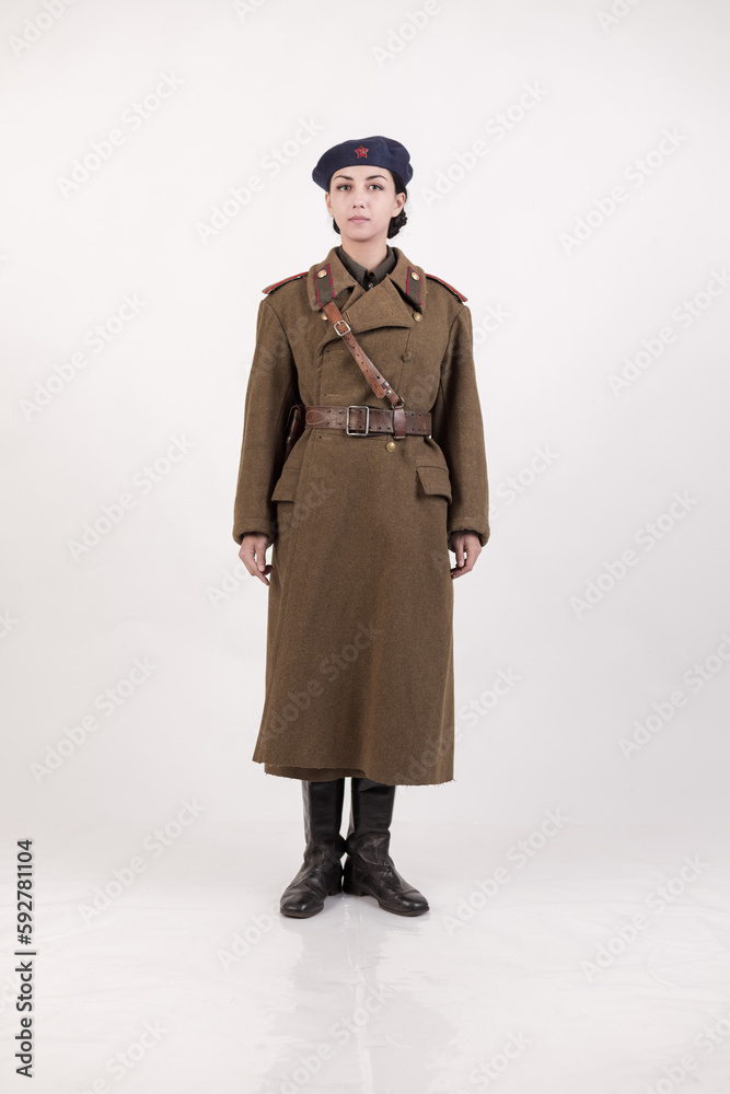 A woman in a retro military uniform, a military police of the Soviet army during World War Two