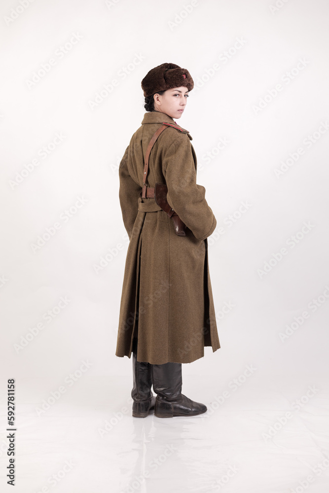 A woman in a retro military uniform, a soldier of the Soviet army during World War Two A woman in a retro military uniform, a soldier of the Soviet army during World War Two