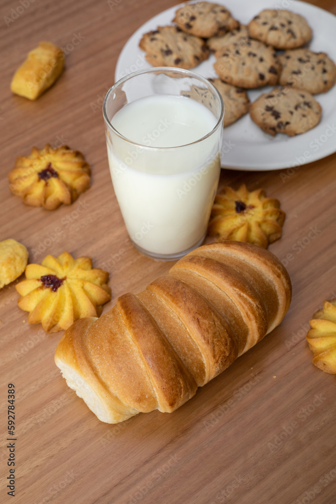 wallpaper of a pastry shop table, with delicious cookies, glass of milk and fresh bread, food and sweets in studio, lifestyle wallpaper of a pastry shop table, with delicious cookies, glass of milk and fresh bread, food and sweets in studio, lifestyle