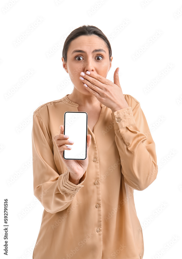 Surprised young woman with smartphone on white background Surprised young woman with smartphone on white background
