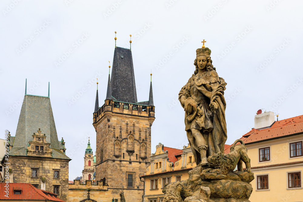 Fototapeta premium Ancient medieval sculptures on the Charles Bridge. Background with selective focus