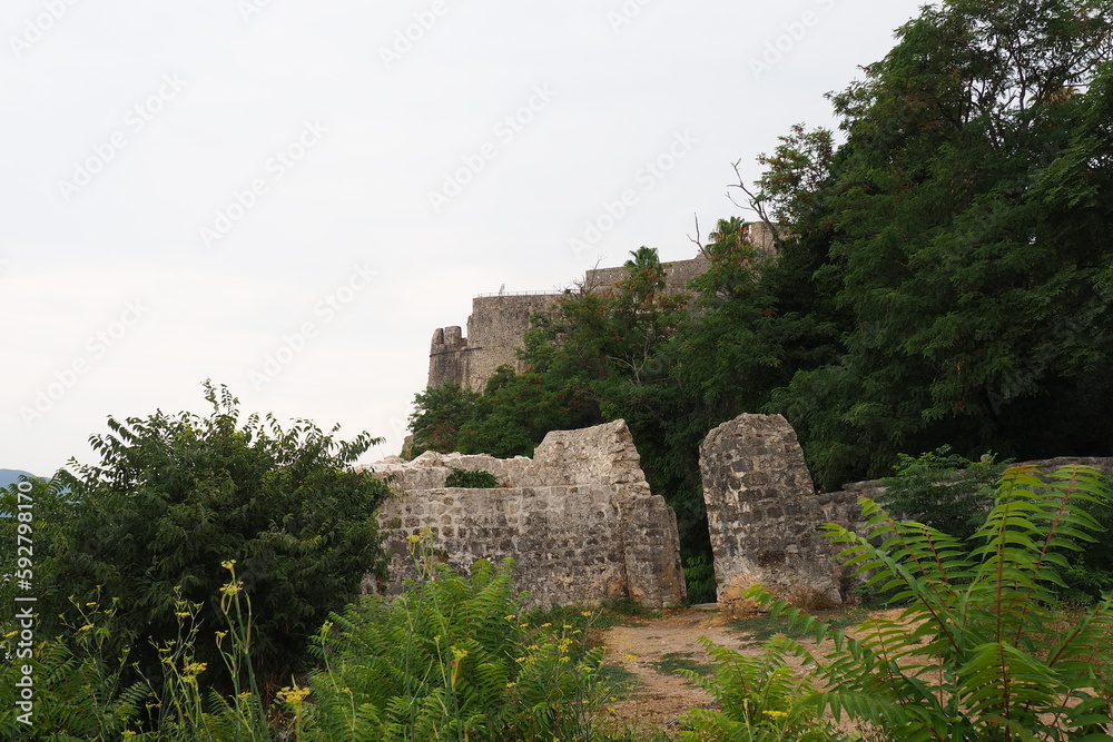 Fort Mezaluna Mesaluna Citadel Citadela Montenegro Herceg Novi. The ruins of an ancient stone fortress, destroyed in an earthquake, fell into the Adriatic Sea, the Mediterranean. Tourist attractions