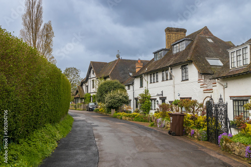 London, UK 14/04/2023, Old cottages in the Hampstead Heath area. Landscaping, manicured gardens photo