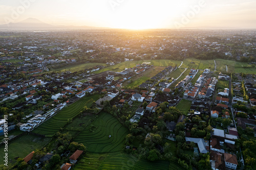 Aerial view of the Canggu area, one of the Bali beachside areas experiencing massive development. The conversion of agricultural land into an entertainment center and housing.