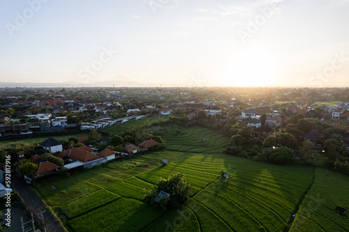 Aerial view of the small remaining rice fields in Canggu, Bali. Canggu experienced the conversion of agricultural land into an entertainment center and housing.
