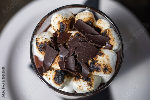 Chocolate shavings and marshmallows in a cup