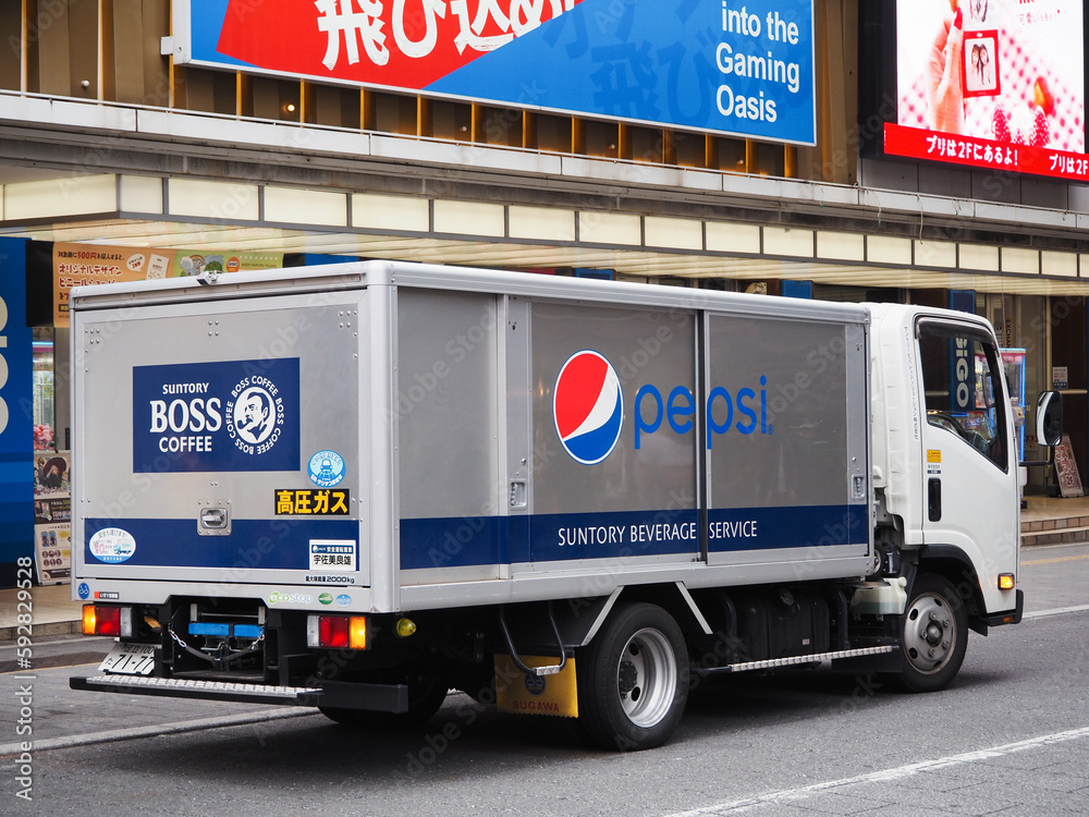 TOKYO, JAPAN April 12, 2023 A drinks delivery truck with Pepsi and