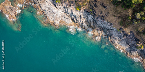 top view of ocean and rock texture. Aerial view of sea and fantastic Rocky coast.