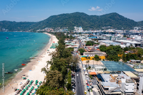 Amazing aerial view of Patong Beach and skyline on sunny day, Phuket, Thailand. (2023) © Jitti
