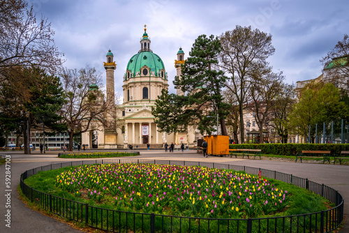 St. Charles Church or Karlskirche, a Baroque church on the south side of Karlsplatz in Vienna, Austria, with a tulip flower garden