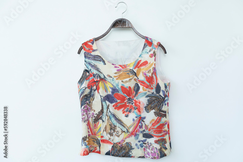  Woman blouse with summer blouse cotton on white background.