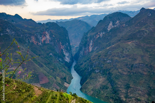 The alley of the Nho Que river. A famous river located in Ha Giang Vietnam is jade green