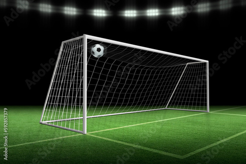 soccer ball in goal, spotlight background in stadium