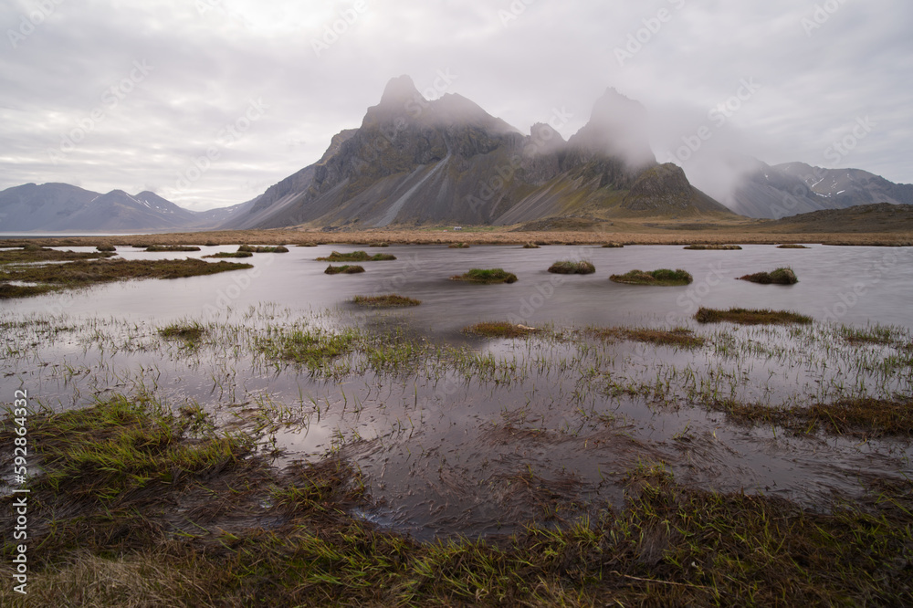 lake and mountains Vestrahorn in Iceland