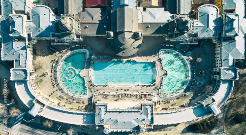 Photography Aerial drone view of the famous Szechenyi Thermal Bath and Spa on a sunny autumn day in Budapest, Hungary