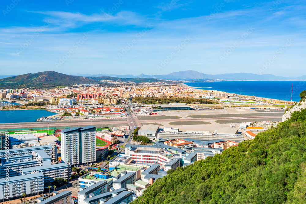 View of the Gibraltar airport and Spanish town La Linea de Conception from the Upper Rock. UK