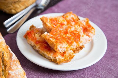 Toasted bread with tomato and oil. Traditional Spanish tapa.