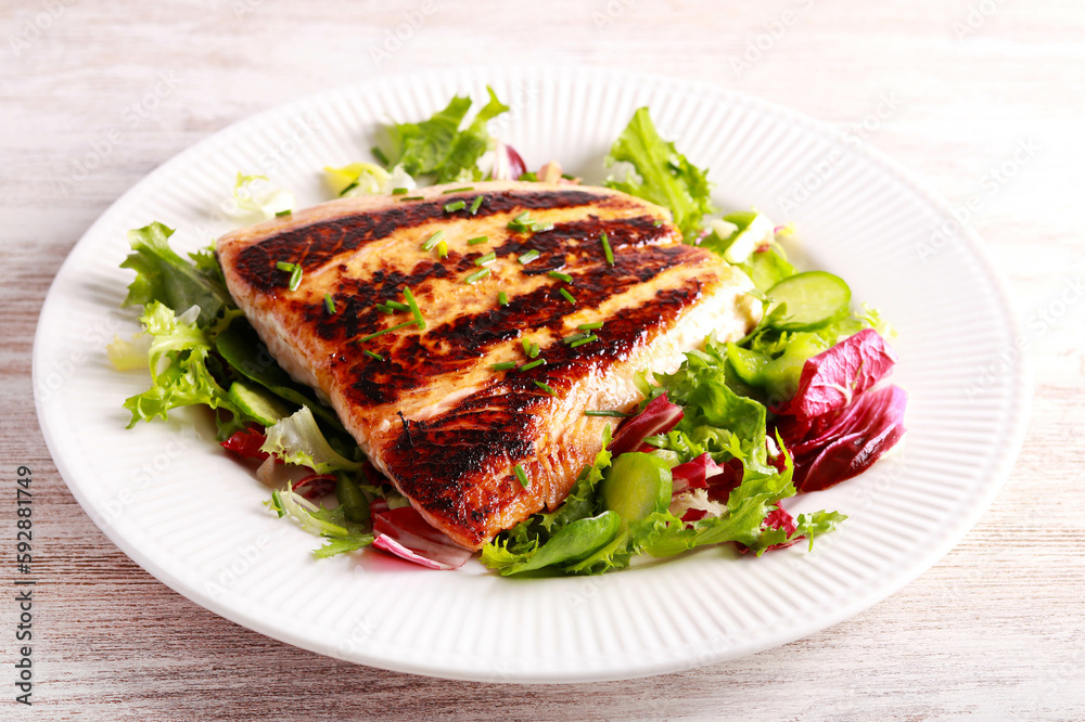 salmon fillet with salad