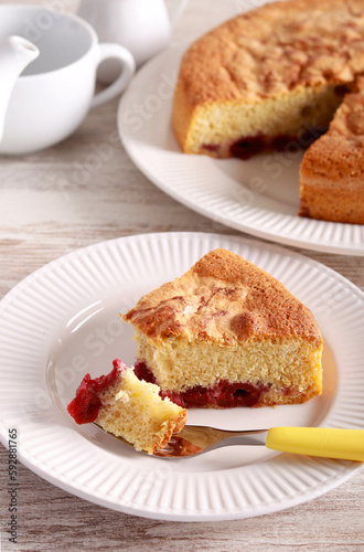 Slice of cherry sponge cake,