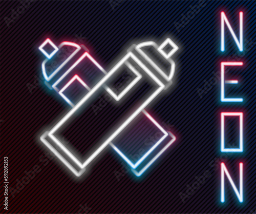 Glowing neon line Paint spray can icon isolated on black background. Colorful outline concept. Vector
