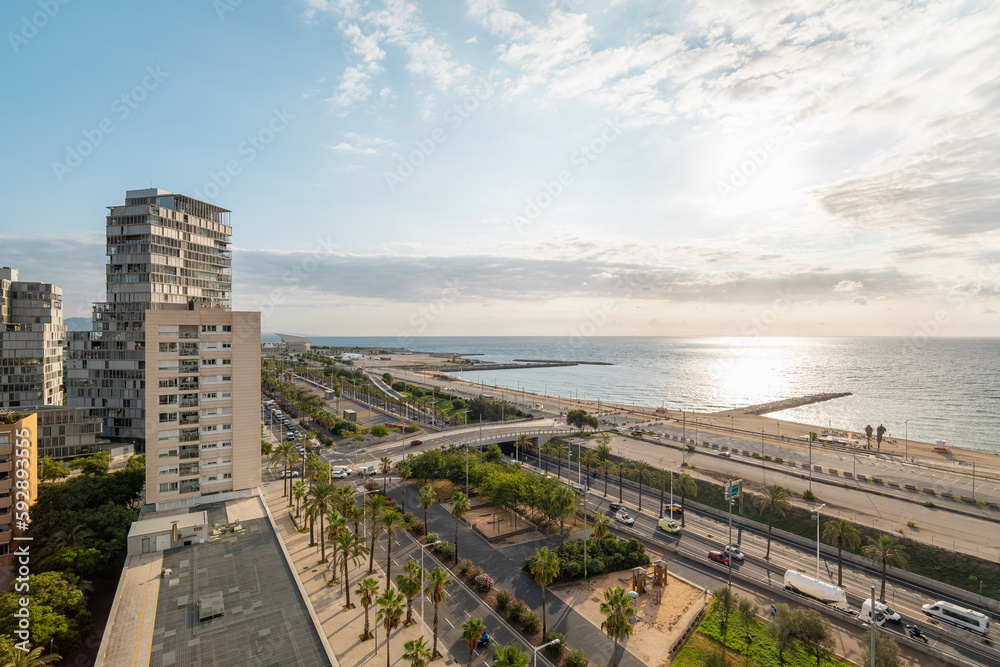 Fototapeta premium Top chic view of the landscaped area of Diagonal Mar in Barcelona, Spain near the coastal zone with highly developed infrastructure