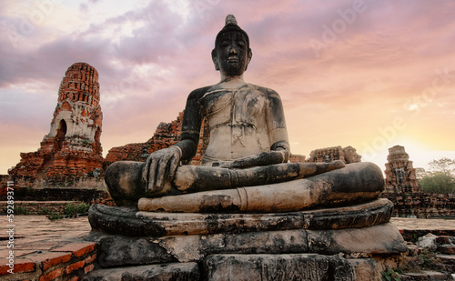 Statue of Buddha in Khmer temple in Ayutthaya, Thailand.