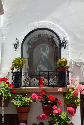 Capilla con flores en el Barrio de la Villa, Priego de Cordoba © BestTravelPhoto