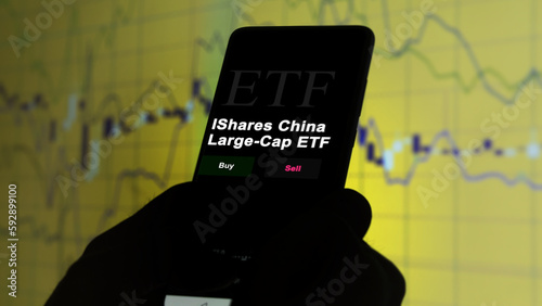 March 2023, An investor analyzing an etf fund iShares China Large-Cap ETF. photo