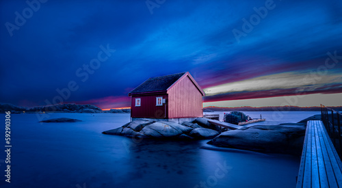 Sun setting on the coastline, Norway photo