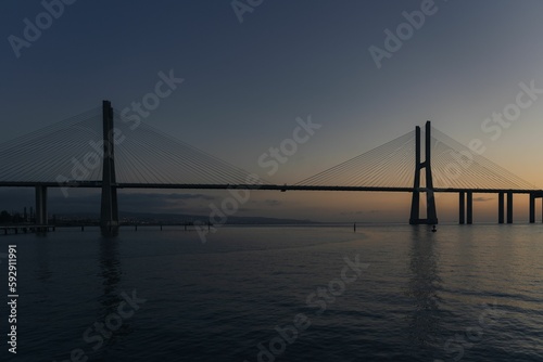 Vasco da Gama Bridge at sunrise in Parque das Nacoes, Lisbon, Portugal
