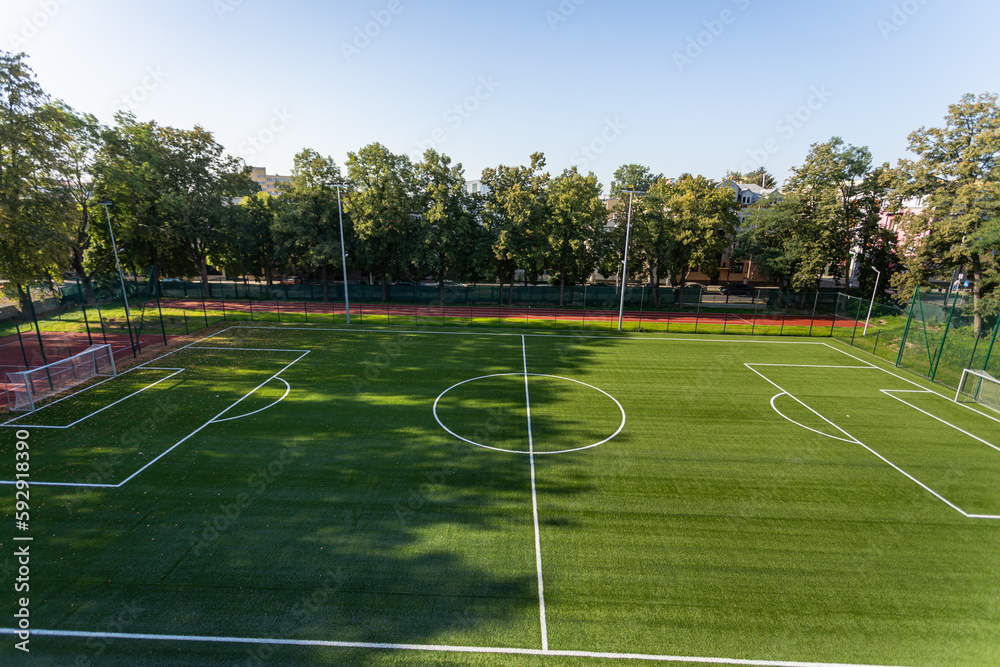 A full-size soccer field with a grass surface.