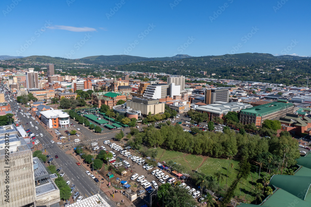 A panoramic view of downtown Pietermaritzburg, Kwazulu-Natal, with surrounding hills in the background.