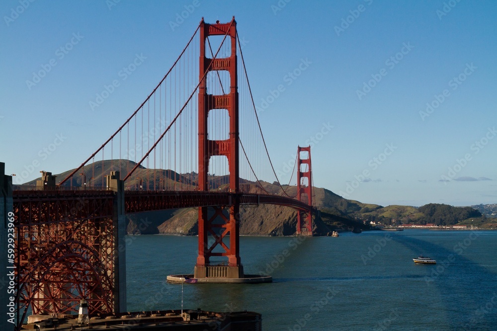 Beautiful shot of the Golden Gate Bridge and the Baker Beach during the day