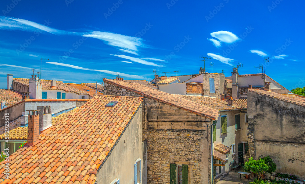 Roofs of old european houses in soft sunlight, Arles, France