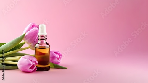 bottle of essential oil with tulips flowers on pink background spa concept banner.