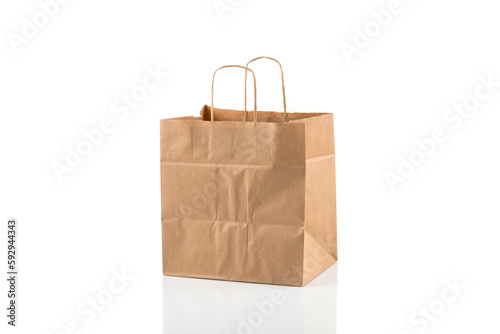 Paper shopping bag on white