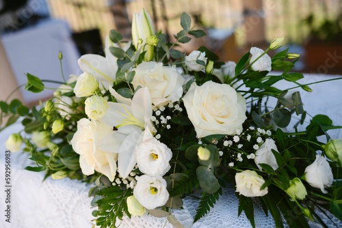 Top view closeup shot of a white flower bouquet for wedding decoration