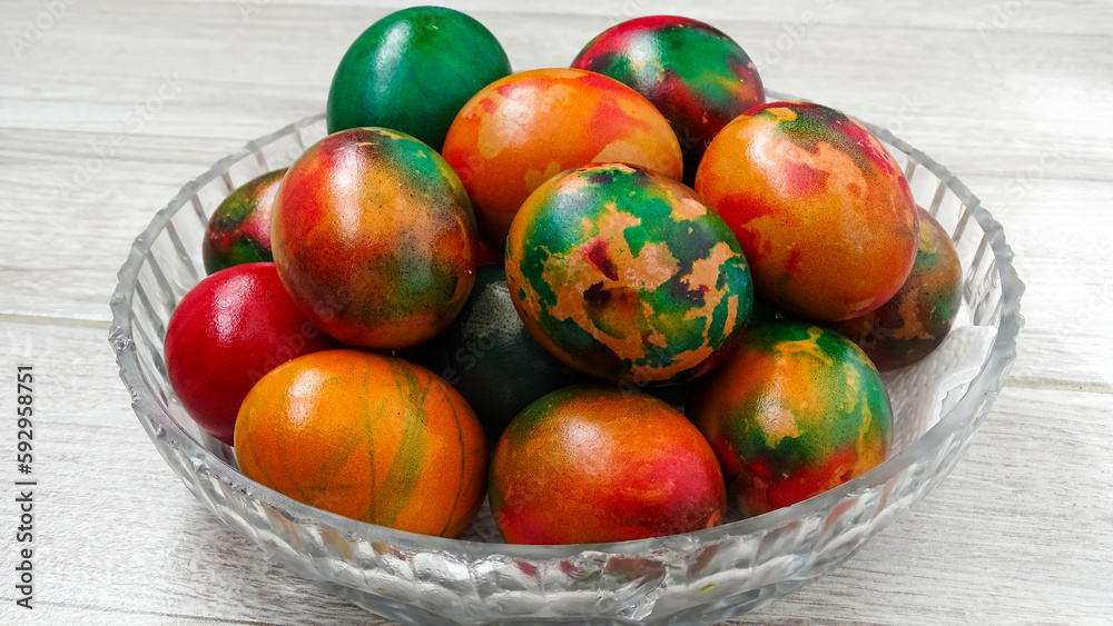 A very beautiful easter eggs in a tray.