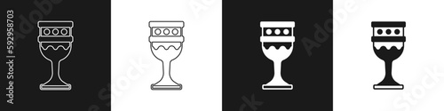 Set Medieval goblet icon isolated on black and white background. Holy grail. Vector