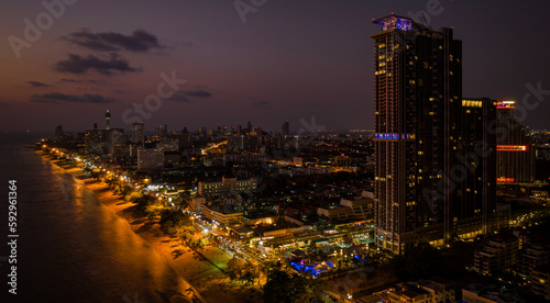 Jontien beach on night time in Pattaya city photo