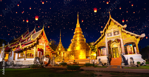 wat phra singh temple in night time in raining season in Chiang mai city © anekoho
