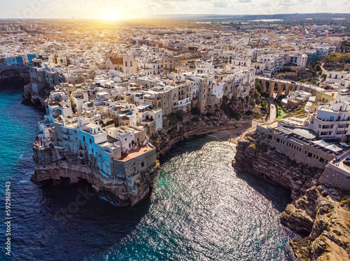 Polignano a Mare drone shot. Aerial view shot of Cala Paura in Puglia, Polignano. photo