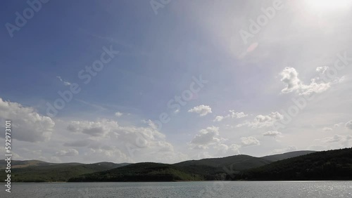 Timelapse clouds lake