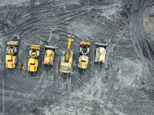 Mining Industry. Aerial View Industrial Excavator. Construction Equipment. Top View of Heavy Machinery. Industrial Background.