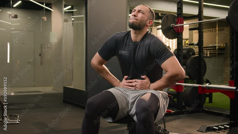 African American multiracial sportsman athlete bodybuilder in sport gym