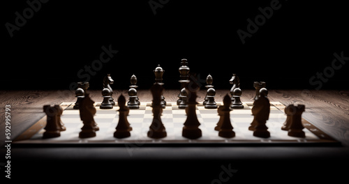 Dramatisches Schachspiel vor schwarzem Hintergrund, Schach photo