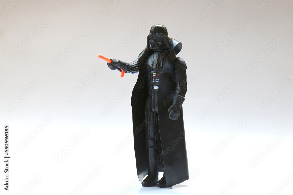 Fototapeta premium Vintage Star Wars Darth Vader Action Figure from Kenner with Lightsaber. Probably from 1978.