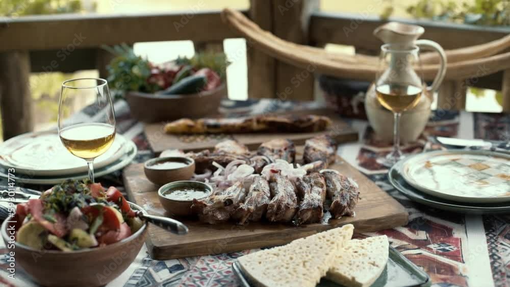 Close up view of national georgian food on wooden table. Georgian cuisine. Close up view of national georgian food on wooden table. Georgian cuisine.