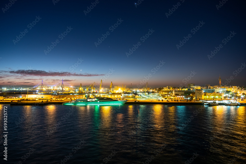 Luxury yacht at the harbour (sea port) of Cadiz and 1812 Constitution Bridge at Dawn early in the morning, Spain, Andalusia